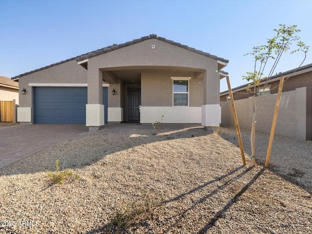 view of front of house with a garage