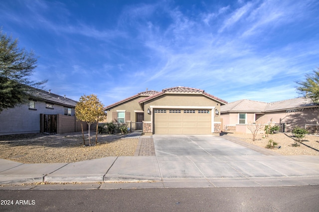 view of front of property with a garage