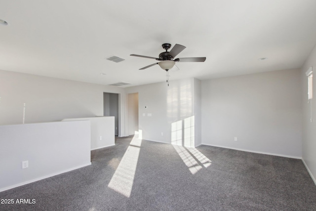 carpeted empty room with ceiling fan