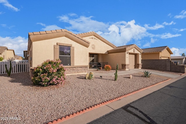 view of front of property featuring a garage