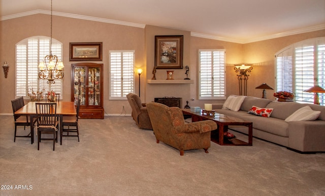 living area with lofted ceiling, ornamental molding, carpet floors, a fireplace, and an inviting chandelier