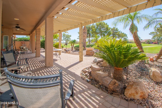 view of patio with a pergola and ceiling fan