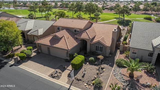 drone / aerial view with a residential view and view of golf course