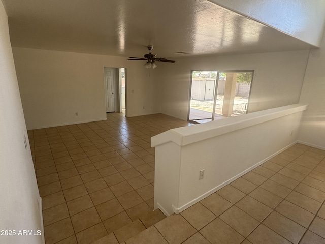 6416 N 78th Ln, Glendale, AZ 85303 - empty room featuring light tile patterned floors and ceiling fan