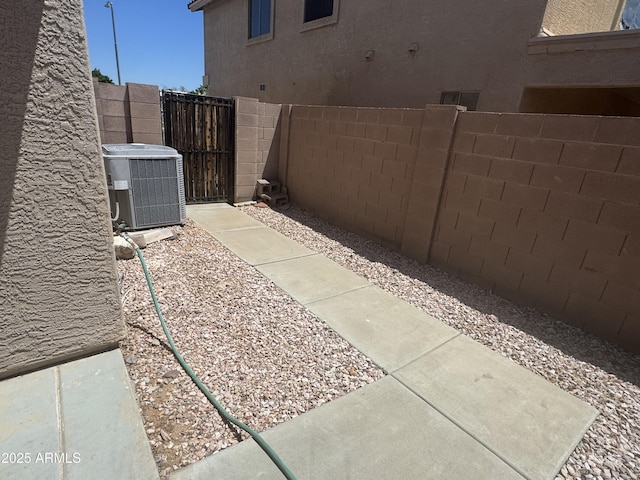 6416 N 78th Ln, Glendale, AZ 85303 - view of patio with central AC and fence