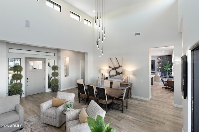 2656 E Oriole Dr, Gilbert, AZ 85297 - living room with light hardwood / wood-style flooring and a high ceiling