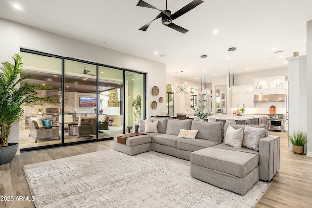 2656 E Oriole Dr, Gilbert, AZ 85297 - living room with light wood-type flooring and ceiling fan