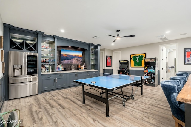 2656 E Oriole Dr, Gilbert, AZ 85297 - game room featuring bar, light hardwood / wood-style flooring, and ceiling fan