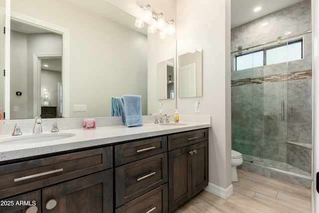 2656 E Oriole Dr, Gilbert, AZ 85297 - bathroom with toilet, hardwood / wood-style flooring, vanity, and walk in shower
