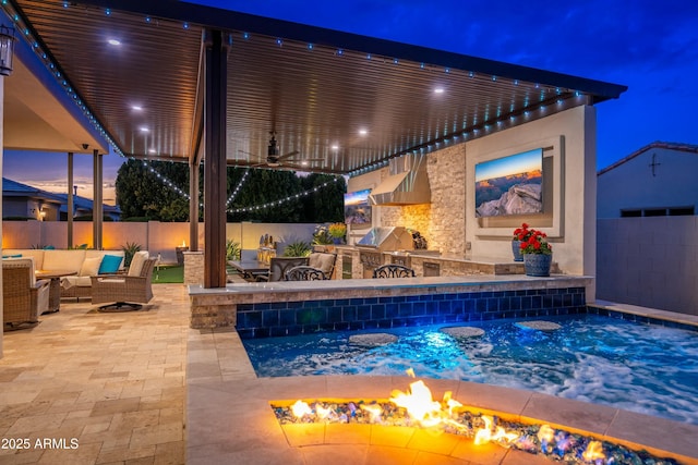 2656 E Oriole Dr, Gilbert, AZ 85297 - view of pool featuring a patio, an outdoor fire pit, and exterior kitchen