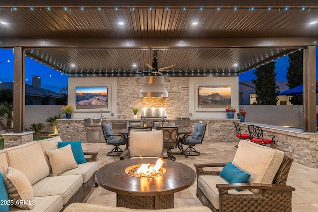 2656 E Oriole Dr, Gilbert, AZ 85297 - view of patio featuring area for grilling, a grill, an outdoor living space with a fire pit, and sink