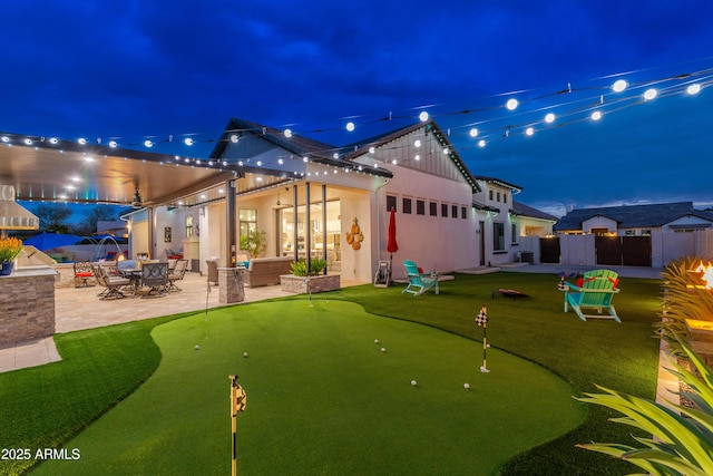 2656 E Oriole Dr, Gilbert, AZ 85297 - back house at twilight featuring a patio