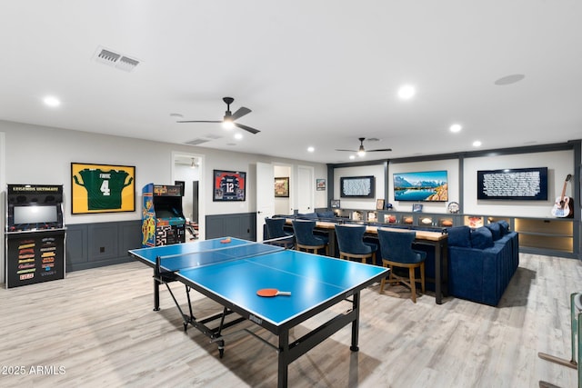 2656 E Oriole Dr, Gilbert, AZ 85297 - rec room featuring ceiling fan, light hardwood / wood-style flooring, and bar area