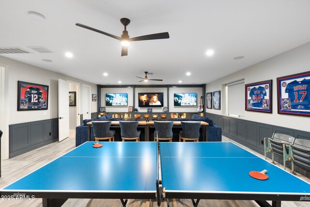 2656 E Oriole Dr, Gilbert, AZ 85297 - rec room featuring light hardwood / wood-style floors and bar