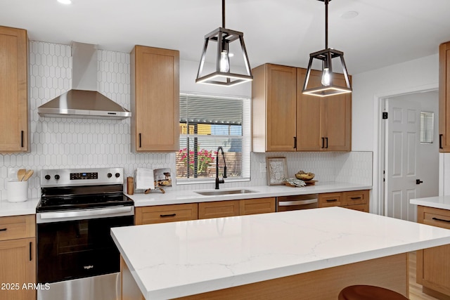 635 N 67th Pl, Mesa, AZ 85205 - kitchen featuring appliances with stainless steel finishes, wall chimney range hood, a sink, decorative backsplash, and hanging light fixtures