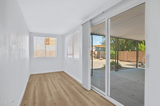 635 N 67th Pl, Mesa, AZ 85205 - empty room with wood finished floors and baseboards