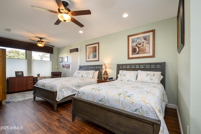 bedroom featuring dark hardwood / wood-style floors and ceiling fan