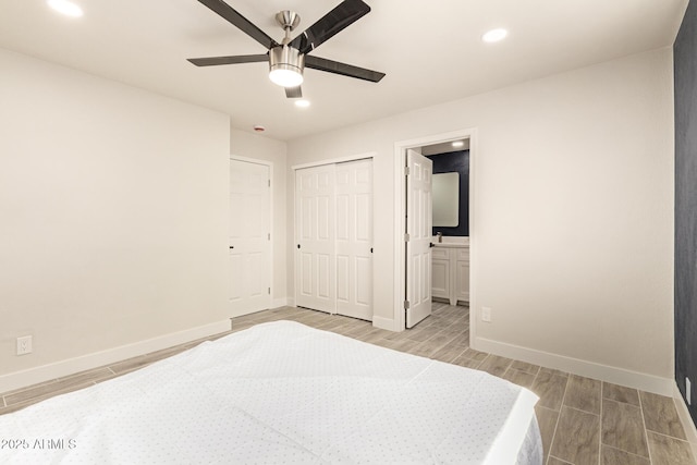 bedroom featuring wood finish floors, baseboards, and recessed lighting