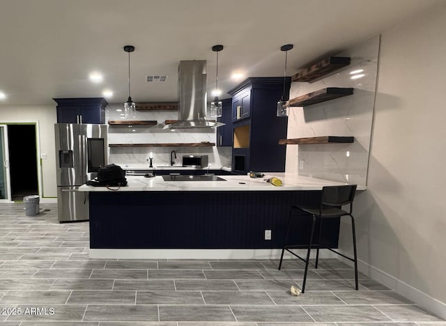 kitchen featuring stainless steel fridge with ice dispenser, a peninsula, island exhaust hood, black electric stovetop, and open shelves