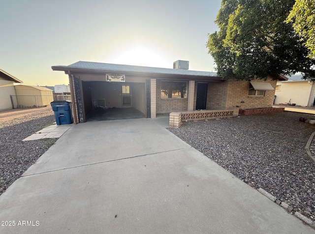1428 S Palo Verde Dr, Apache Junction, AZ 85120 - single story home with driveway, brick siding, a garage, and central AC