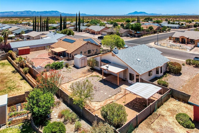 birds eye view of property featuring a residential view and a mountain view