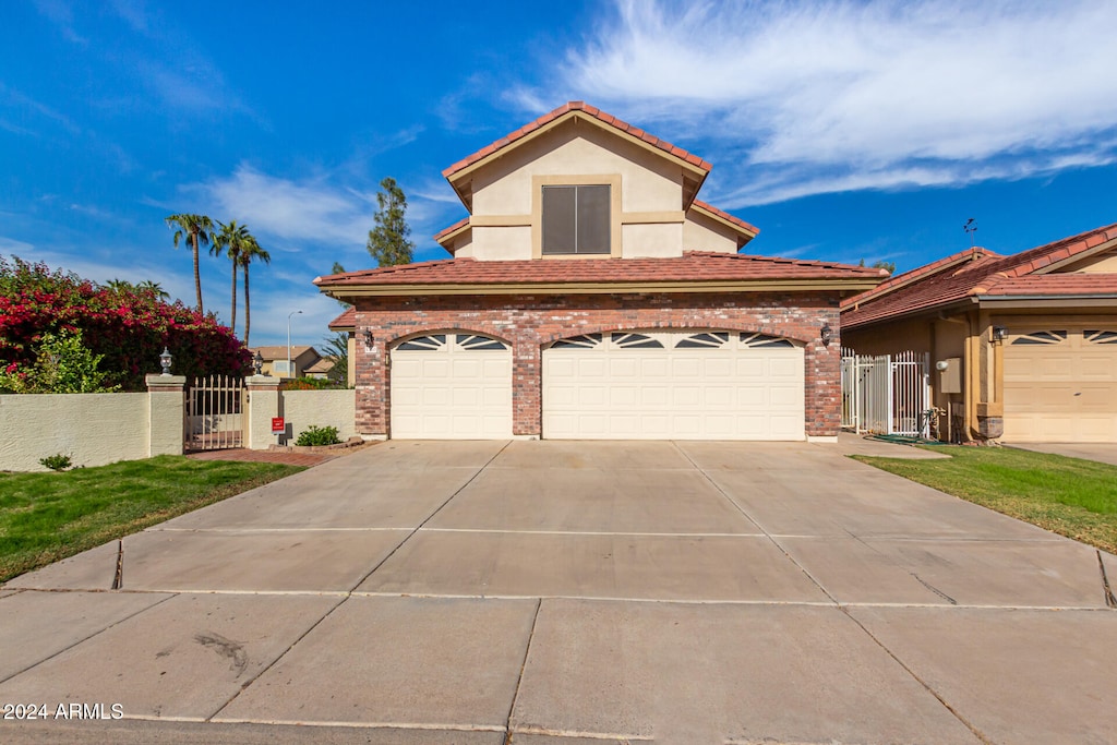 view of front of property featuring a garage