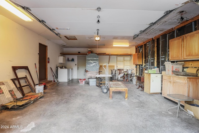 garage featuring separate washer and dryer