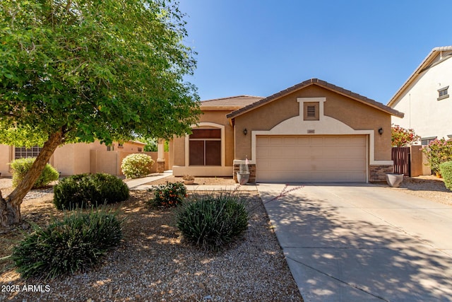 2140 S Benton Cir, Mesa, AZ 85209 - view of front of property featuring stucco siding, driveway, an attached garage, a tile roof, and fence