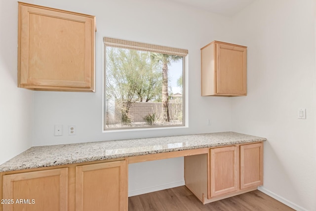 2140 S Benton Cir, Mesa, AZ 85209 - unfurnished office featuring built in desk, light wood-style floors, and baseboards
