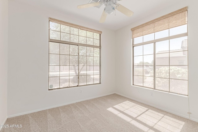 2140 S Benton Cir, Mesa, AZ 85209 - carpeted spare room with healthy amount of natural light, baseboards, and a ceiling fan