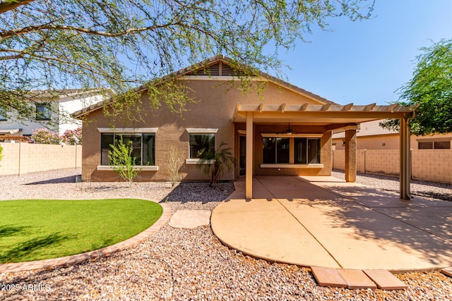 2140 S Benton Cir, Mesa, AZ 85209 - rear view of house with a ceiling fan, stucco siding, a fenced backyard, and a patio