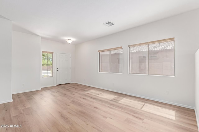 2140 S Benton Cir, Mesa, AZ 85209 - unfurnished room featuring light wood-style floors and baseboards