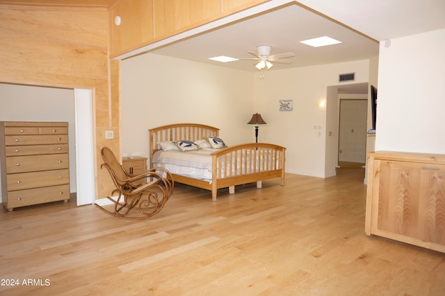 bedroom featuring ceiling fan and light hardwood / wood-style floors