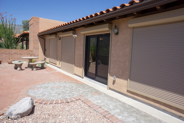 back of house with a patio area