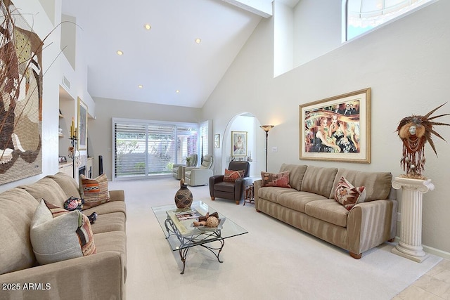 10068 E Cinnabar Ave, Scottsdale, AZ 85258 - living area with recessed lighting, baseboards, a towering ceiling, arched walkways, and visible vents