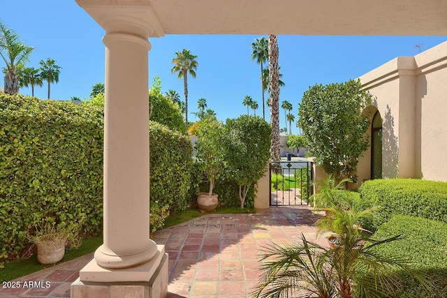 10068 E Cinnabar Ave, Scottsdale, AZ 85258 - view of patio / terrace with a gate