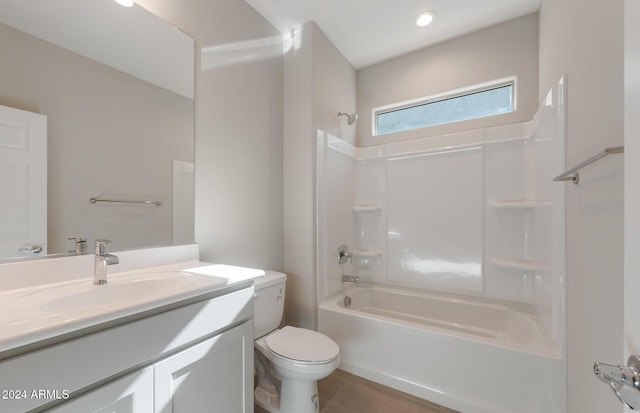 full bathroom featuring tile patterned flooring, vanity, toilet, and bathing tub / shower combination