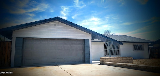 ranch-style home with a garage