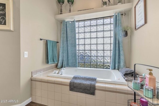 full bathroom featuring a garden tub