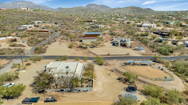 birds eye view of property featuring a mountain view