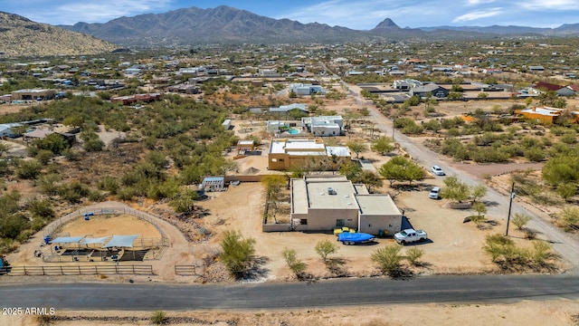 drone / aerial view featuring a mountain view