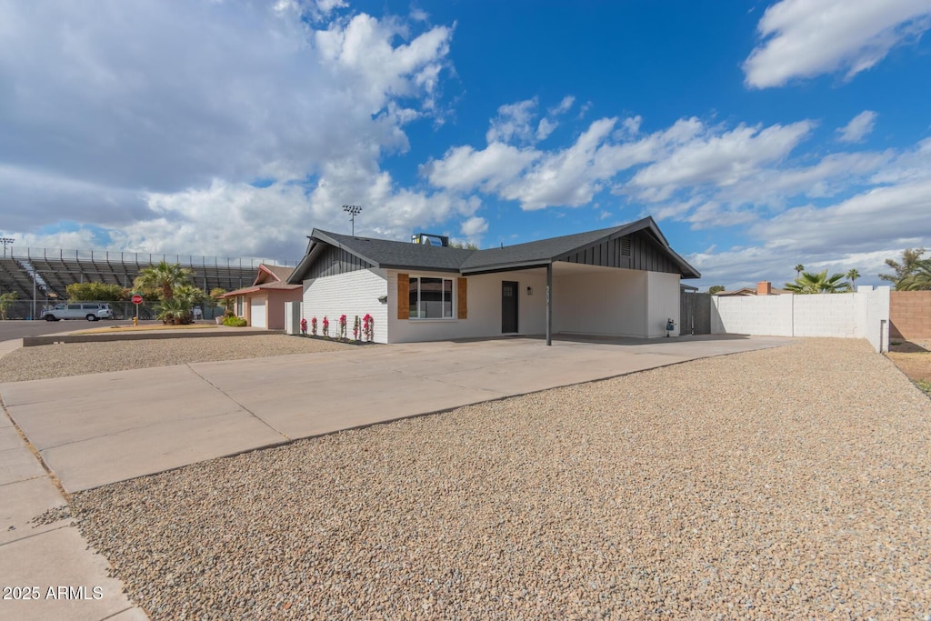 ranch-style home featuring a garage