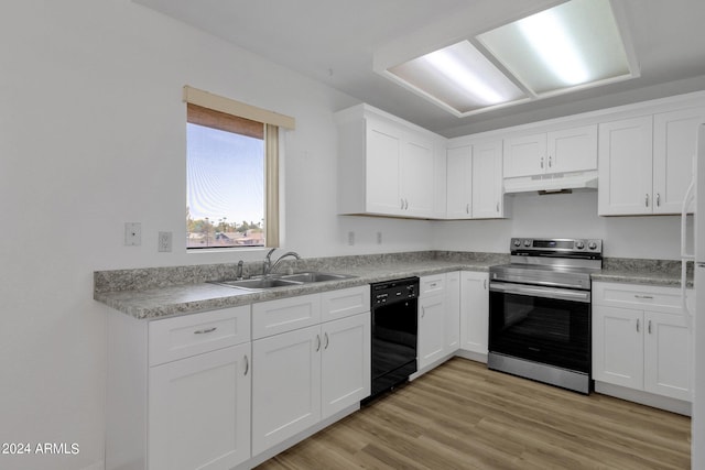 kitchen with black dishwasher, sink, stainless steel range with electric stovetop, white cabinets, and light hardwood / wood-style flooring