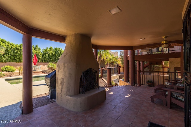 view of patio / terrace with fence and a fenced in pool
