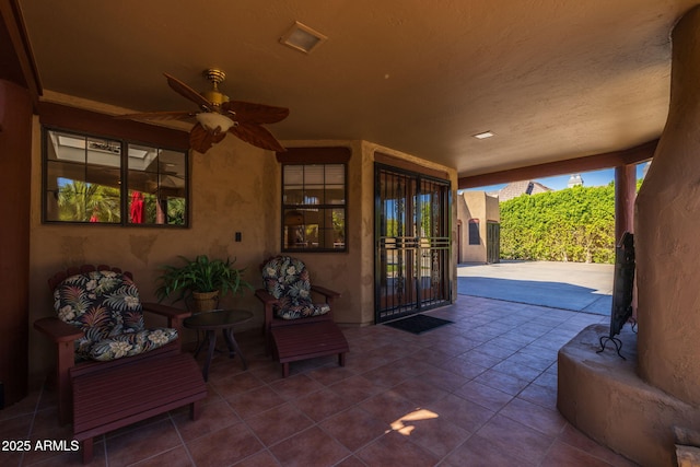 view of patio / terrace with ceiling fan