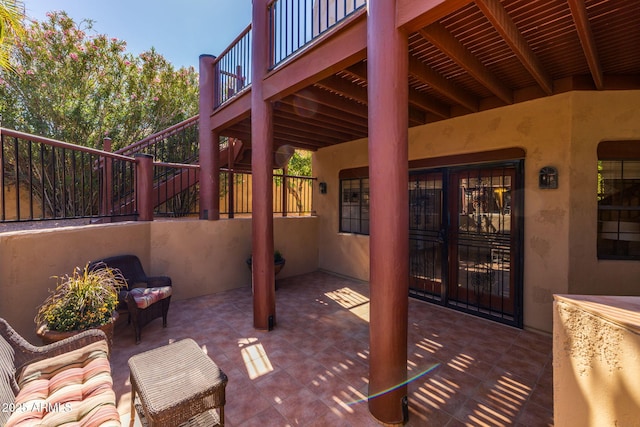 view of patio / terrace featuring stairs
