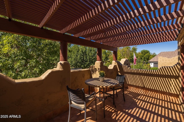 view of patio with a pergola and outdoor dining space
