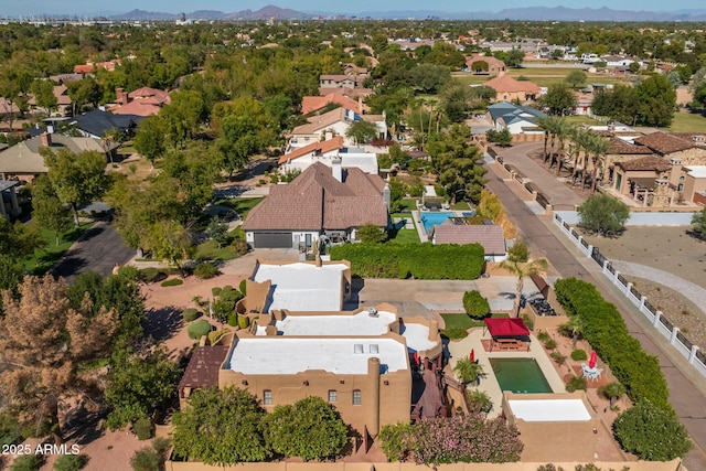 drone / aerial view featuring a mountain view and a residential view
