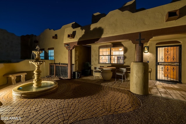 view of patio at twilight