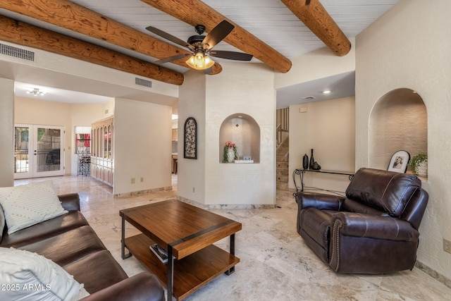 living room featuring a ceiling fan, marble finish floor, beam ceiling, and visible vents